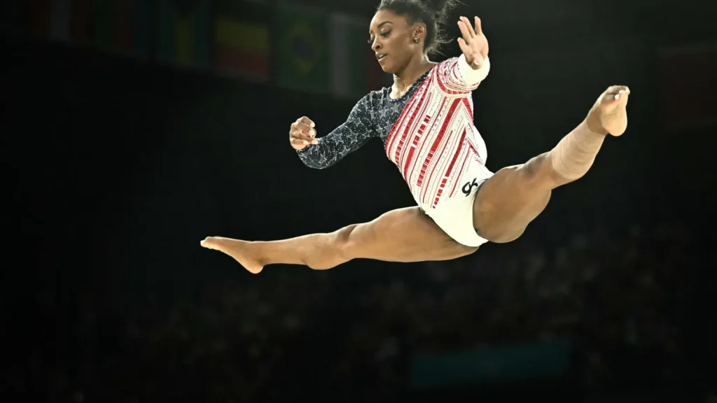 gymnast Simone Biles 2024 Gold Medal Team Olympics radiant coach Trudy Shines